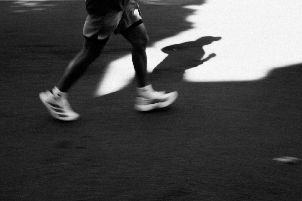 Black and white image of a person running